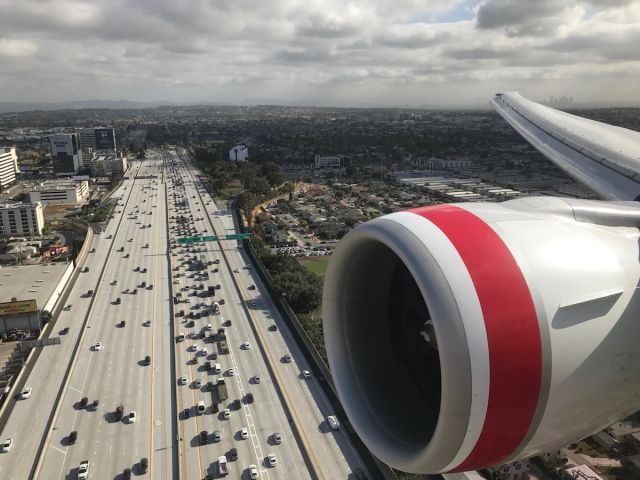 BOEING 777-300ER — - Over I-405, coming back after spending some time in Melbourne.