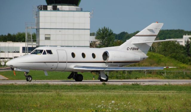 Dassault Falcon 10 (FEX11) - C-FBNW Falcon 10 msn 190 of FlightExec CYKZ Buttonville Airport (Toronto) operating as flight FEX11 Aug 8 2013 taxiing on runway 15 for departure to Rochester NY>