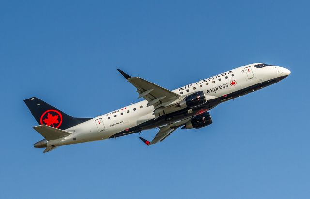 Embraer 175 (C-FRQW) - SKV7618 climbs out of YYZ from runway 24L bound for Reagan National