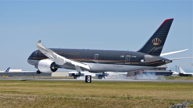 Boeing 787-8 (JY-BAA) - BOE695 touching down on Rwy 34L to complete its maiden flight on 8/4/14. (LN:194 / cn 37983).