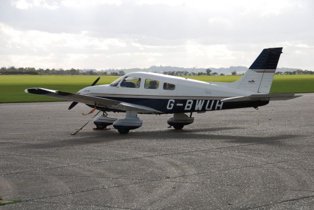 Piper Cherokee (G-BWUH) - Archer III on the ramp at Duxford in England.