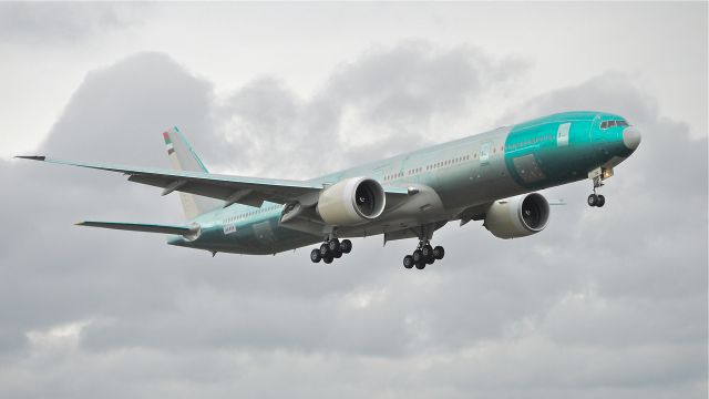 BOEING 777-300 (A6-ETN) - BOE264 on final approach to runway 16R to complete its maiden flight on 3/1/13. (LN:1086 cn 39689).