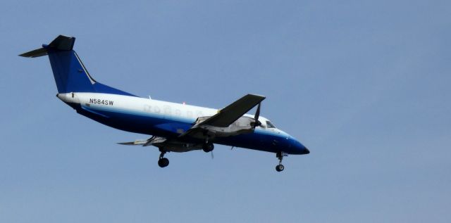 Embraer EMB-120 Brasilia (N584SW) - On short final is this 2019 Embraer 120ER Brasilia Twin-Turboprop in the Spring of 2023.