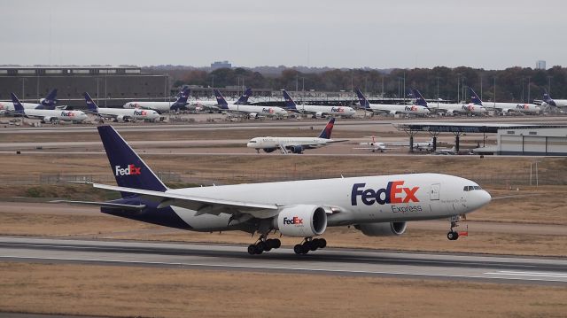 BOEING 777-200LR (N868FD) - "Joseph" arriving on 18C.