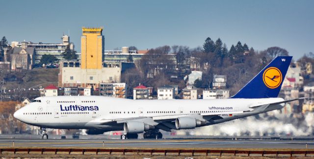 Boeing 747-400 (D-ABVU) - A long shot, with a 600 mm lens from Castle Island, of Lufthansa 747 taxiing in after landing at KBOS.