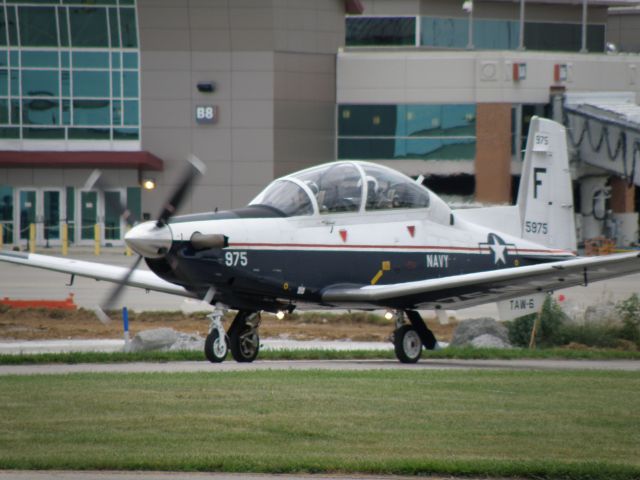 Raytheon Texan 2 (BN165975) - A U.S. Navy T-6A, Texan II (165975), out of NAS Pensacola taxis to Air 51 (FBO) at Blue Grass Airport (KLEX) for a fueling stop....