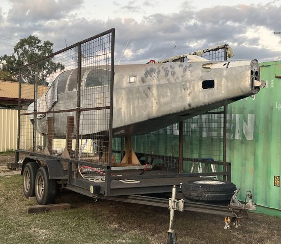 Beechcraft 35 Bonanza (VH-ILJ) - Getting ready to be transported 