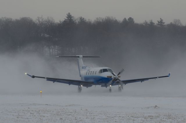 Pilatus PC-12 (N493AF) - Landing on Runway 26 in gusty crosswinds and blowing snow