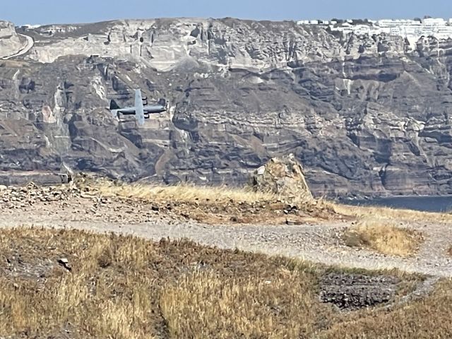 Lockheed C-130 Hercules — - santorini rare flyby