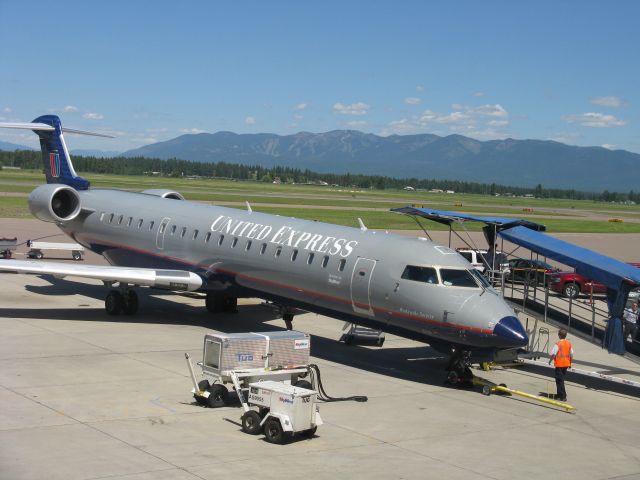 Canadair Regional Jet CRJ-700 (N703SK) - N703SK, a United Airlines Express CRJ-700 at Kalispell Airport, also known as Glacier Park Airport (KGPI). N703SK was getting ready to depart to Chicago. This picture was taken on June 27, 2010.