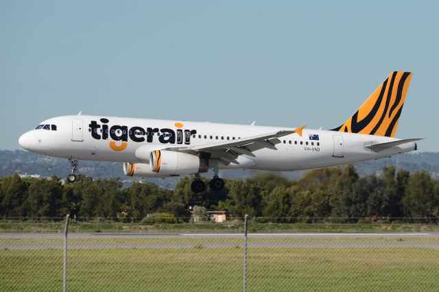 Airbus A320 (VH-VND) - About to put down on runway 05. Wednesday, 21st May 2014.