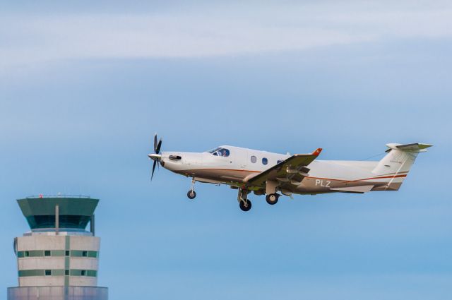 Pilatus PC-12 (ZK-PLZ) - Finally, I got to photograph my favourite big turbine single, a NZ registered Pilatus PC-12/45E, and I managed to time it perfectly to include the Christchurch Control Tower and the pilot looking at me! Taken with my Nikon AFS 300mm/f2.8 lens