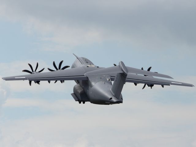 — — - Departing RAF Fairford. The pipe sticking out of the top, behind the wings trailing edge is the APU exhaust.