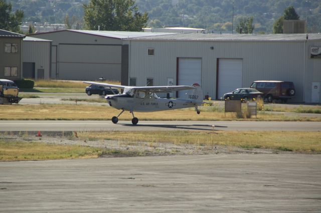 N6735Q — - A cessna bird dog practicing some touch and gos while the ford trimotor stopped by. 