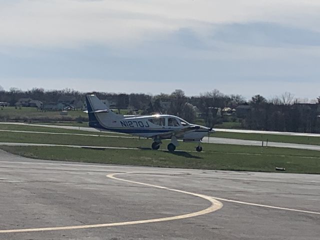 Rockwell Commander 114 (N1270J) - N1270J (AC11) departing Quakertown Airport (KUKT)br /Photo Date: April 8, 2023