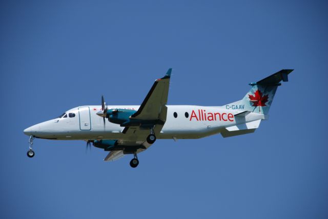 Beechcraft 1900 (C-GAAV) - Air Georgian operating with Air Canada July 1st 2008 landing 23L Toronto Intl.  1st visit to Toronto with new AC paint.