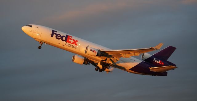 Boeing MD-11 (N572FE) - N572FE departing & folding the gear out of PANC (Anchorage, AK) in late evening golden hour light!