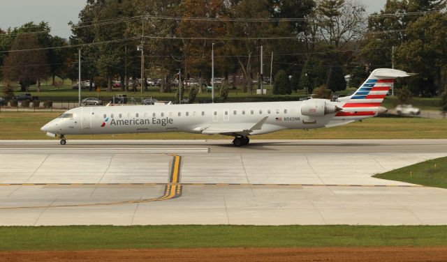 Canadair Regional Jet CRJ-900 (N565NN) - PSA 5450 to KCLT Charlotte International lined up and waiting for departure runway 22. The new taxiway A6 just opened recently. At the very bottom of the frame, you can see where the old taxiway Alpha was, which is now dirt. 