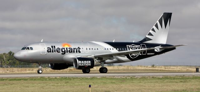 Airbus A319 (N328NV) - Roaring down Runway 21 for departure to PDX. Look closely and you'll see the pilot looking at me.