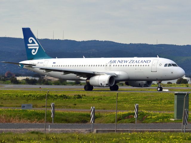 Airbus A320 (ZK-OJI) - On taxi-way heading for take off on runway 05, for flight home to Auckland, New Zealand. Thursday 12th July 2012.