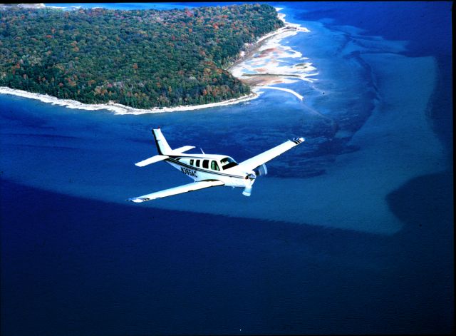 Beechcraft Bonanza (36) (N365AC) - Over Power Island, West Grand Traverse Bay