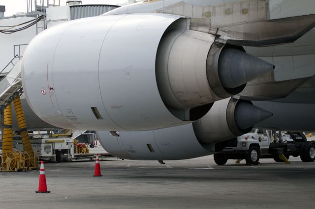 Airbus A340-600 (D-AIHZ) - Big Motors: Rolls-Royce Trents on the left wing of a big Airbus 340-600 "Leipzig" just arrived at Charlotte, North Carolina USA  from Munich, Germany. These engines make about 56,000 pounds of thrust each. The airplane holds 380 passengers.