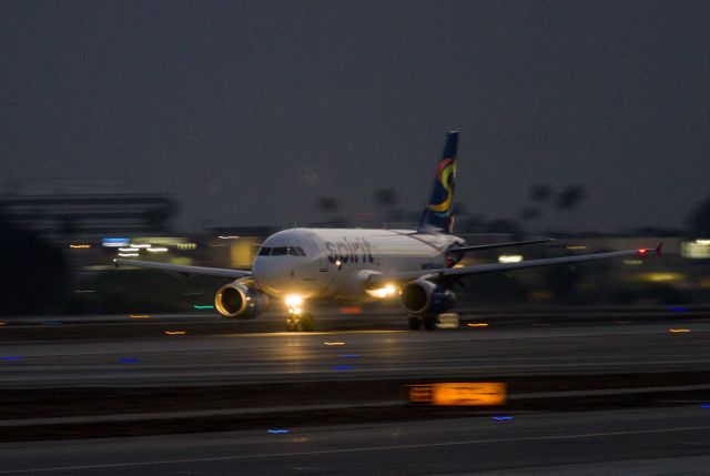 Airbus A319 — - Predawn takeoff on runway 24 R at Los Angeles International Airport, California USA. Sorry, I didnt get the tail number. Too dark! 