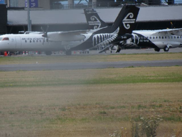 de Havilland Dash 8-300 (ZK-NEC) - At Gates.