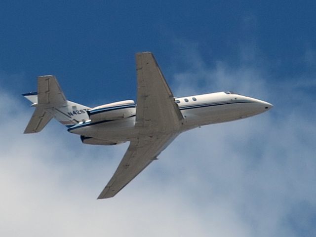 Hawker 800 (N426TM) - Take off runway 10L.