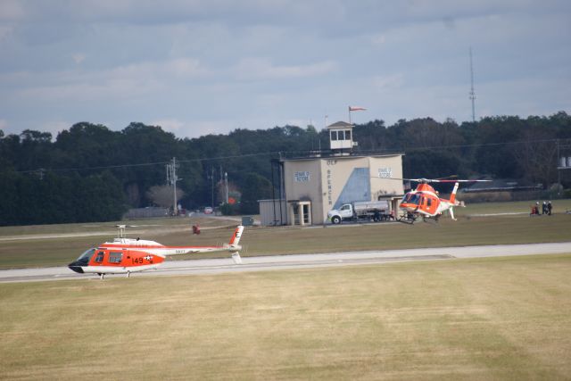 DENEL Koala (17-0139) - New TH-73A landing next to an old TH-57C at NOLF Spencer