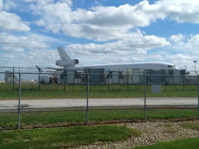 Boeing MD-11 (N513SN) - Ive seen her at the Cleveland U.P.S. facility every time Ive gone in and out of NASA Glenn for quite awhile.  Not used to seeing non-UPS Brown A/C there.:)br /Based on history appears to be running SDF/CLE turn arounds.