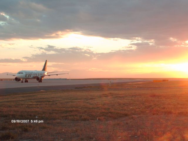 Airbus A319 (N908FR) - Sunset taxi in...