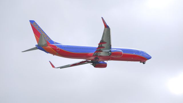 Boeing 737-800 (N8307K) - BOE606 (LN:4027) flies a missed approach over runway 16R during it maiden flight, 4/27/12.