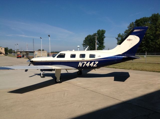 Piper Malibu Mirage (N744Z) - On the ramp at Neal Armstrong airport KAXV