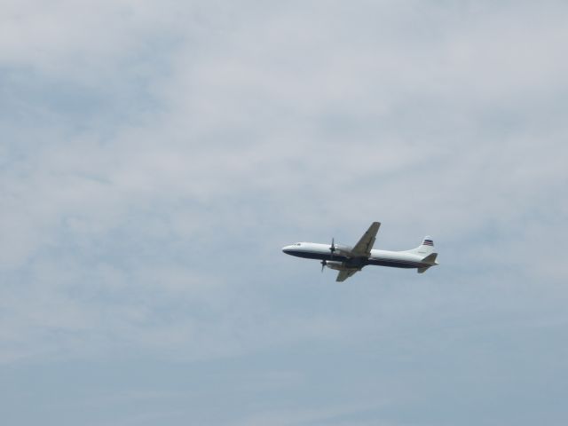 CONVAIR CV-580 (N361FL) - Low approach over Runway 24.