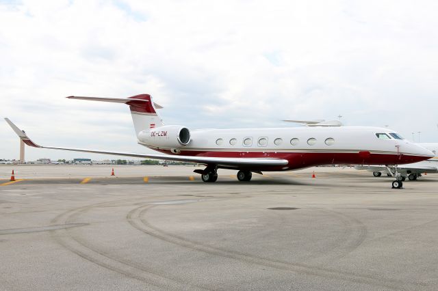 Gulfstream Aerospace Gulfstream G650 (OE-LZM) - OE-LZM sitting on the ramp in a cloudy Miami day. Would leave for Nassau a few days later. New to the DB.