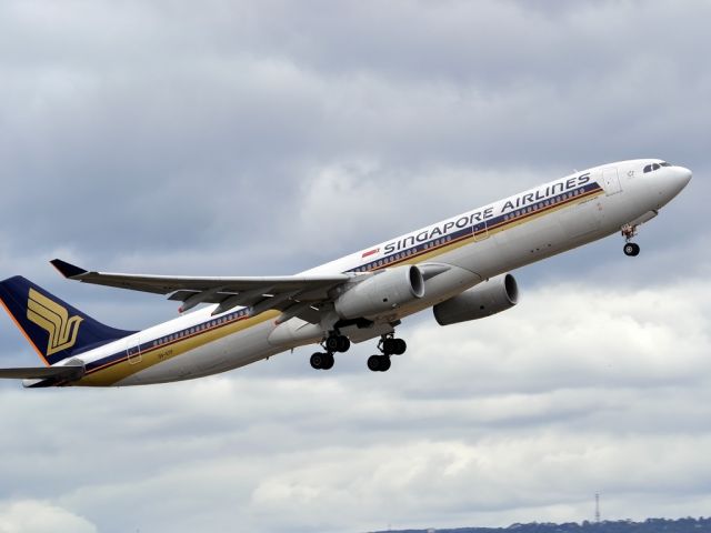 Airbus A330-300 (9V-STP) - Getting airborne off runway 23 and heading home to Singapore. Tuesday 27th December 2011.