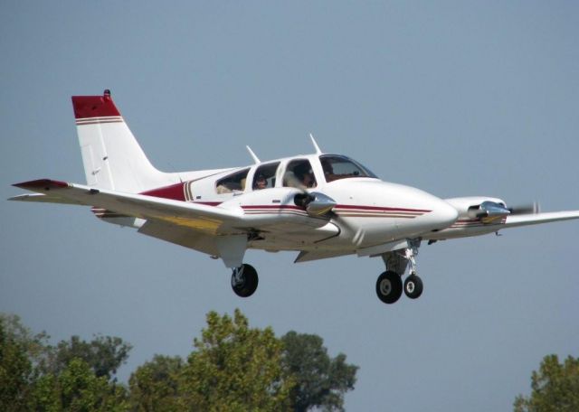 Beechcraft Baron (58) (N24MA) - At Downtown Shreveport.