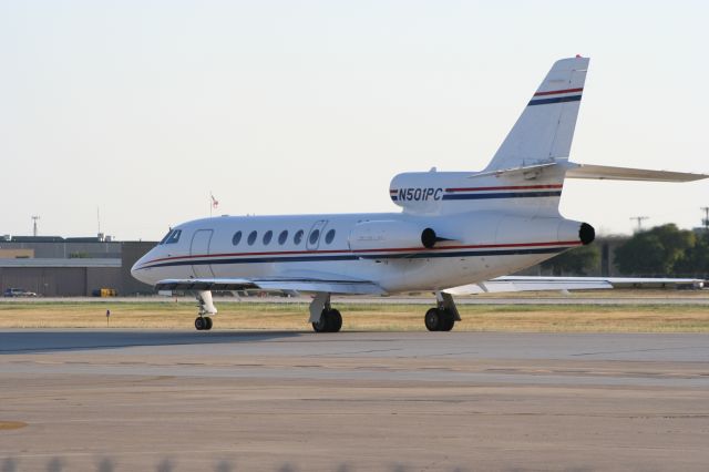 Dassault Falcon 50 (N501PC) - Taxiing out for evening departure from RWY 33 at KADS.