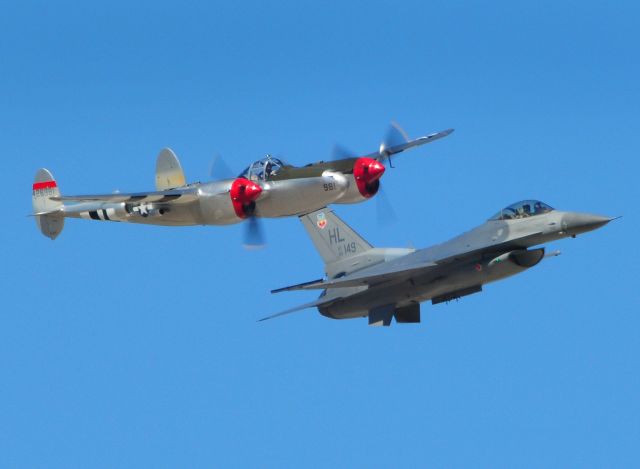 — — - USAF Heritage formation flyover with Lockheed P-38 Lighting "Honey Bunny" and on left wing F-16 Falcon from Hill AFB, during 2012 Capitol Air Show, Mather Airfield, Rancho Cordova, Ca. KHMR, HMR