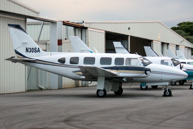 Piper Navajo (N30SA) - Aztec Airways Navajo parked on the end of a line up of sister ships on 14-Oct-22.