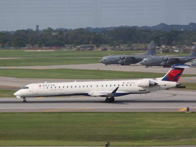 Canadair Challenger (N937XJ) - Taking off on Runway 30R at MSP on 07/31/2011