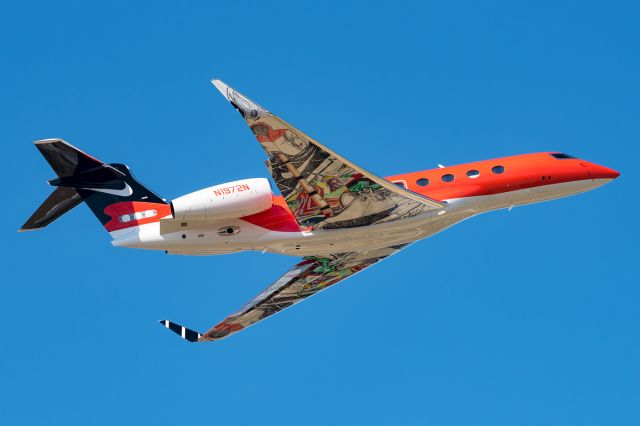 Gulfstream Aerospace Gulfstream G650 (N1972N) - Nike's stunning new G650ER departs Dallas Love Field for Hillsboro, Oregon on her very first trip for the company. Quite the artwork under those big wings!