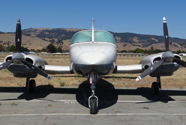 Cessna 411 (N821KB) - The "Pan American Corp. from San Jose, CA purchased this plane a while back and left it here at South County Airport to rot. If your not planning to fly the plane, why buy it? Another group of idiots letting another beautiful plane go to waste.