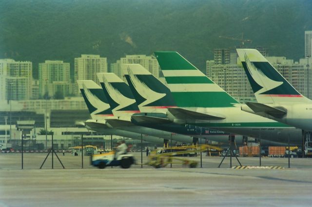 — — - Cathay Pacific at Hong Kong Kai Tak International Airport in 1996