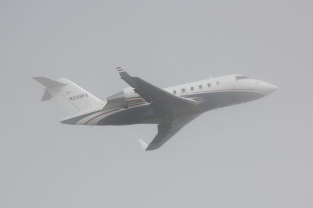 Canadair Challenger (N339FX) - Flexjet Flight 339 (N339FX) departs Sarasota-Bradenton International Airport enroute to Teterboro Airport