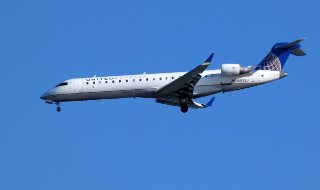 Canadair Regional Jet CRJ-700 (N163GJ) - Shown here on approach is a United Express Canadair Regional Jet CRJ-700 in the Summer of 2018.