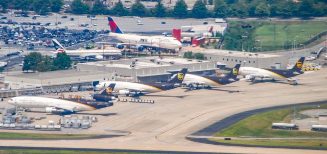 Boeing MD-11 — - Taking off from ATL with a great view of the UPS ramp as well as the Delta Museum.