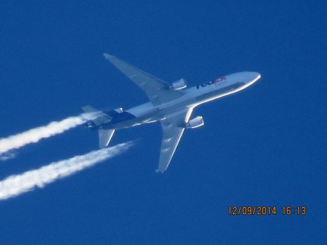 Boeing MD-11 (N625FE) - FedEx flight 945 from MEM to SLC over Baxter Springs Kansas (78KS) at 38,000 feet.