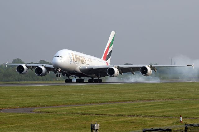 Airbus A380-800 (A6-EOS) - UAE19 leaving some smoke after landing on the flight from Dubai.